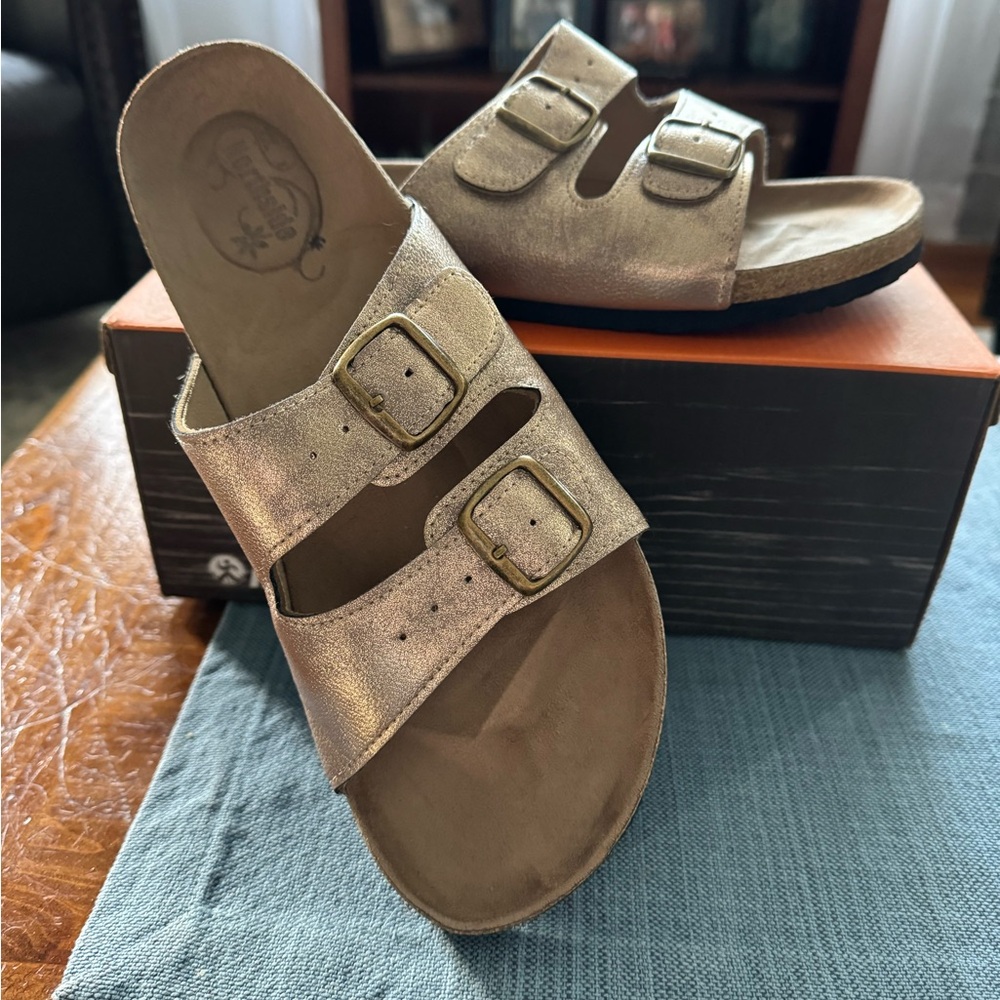 Metallic gold women’s sandals.  Worn twice.  Great quality lightweight sandals.